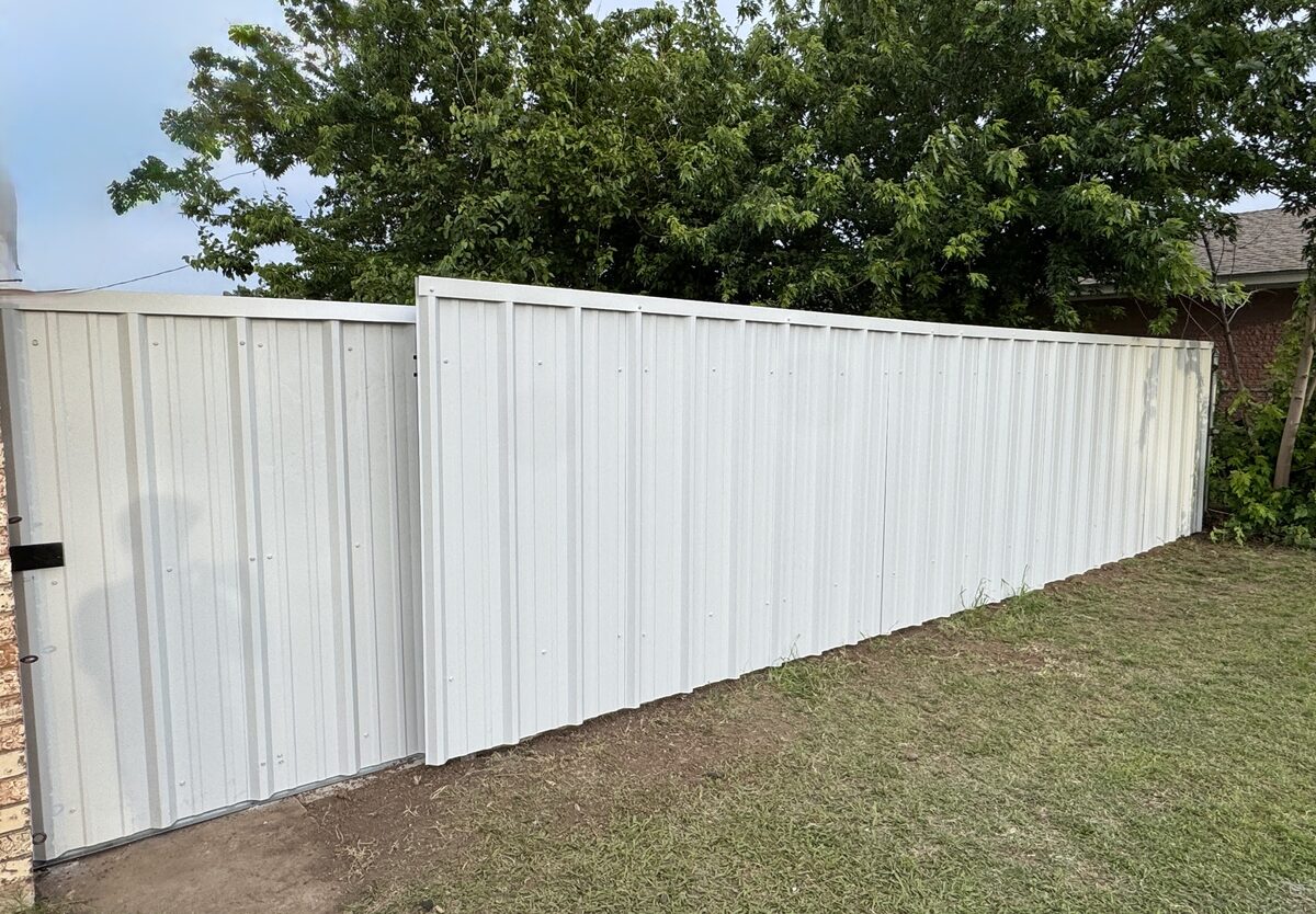 White vinyl privacy fence installed by SWY Fencing