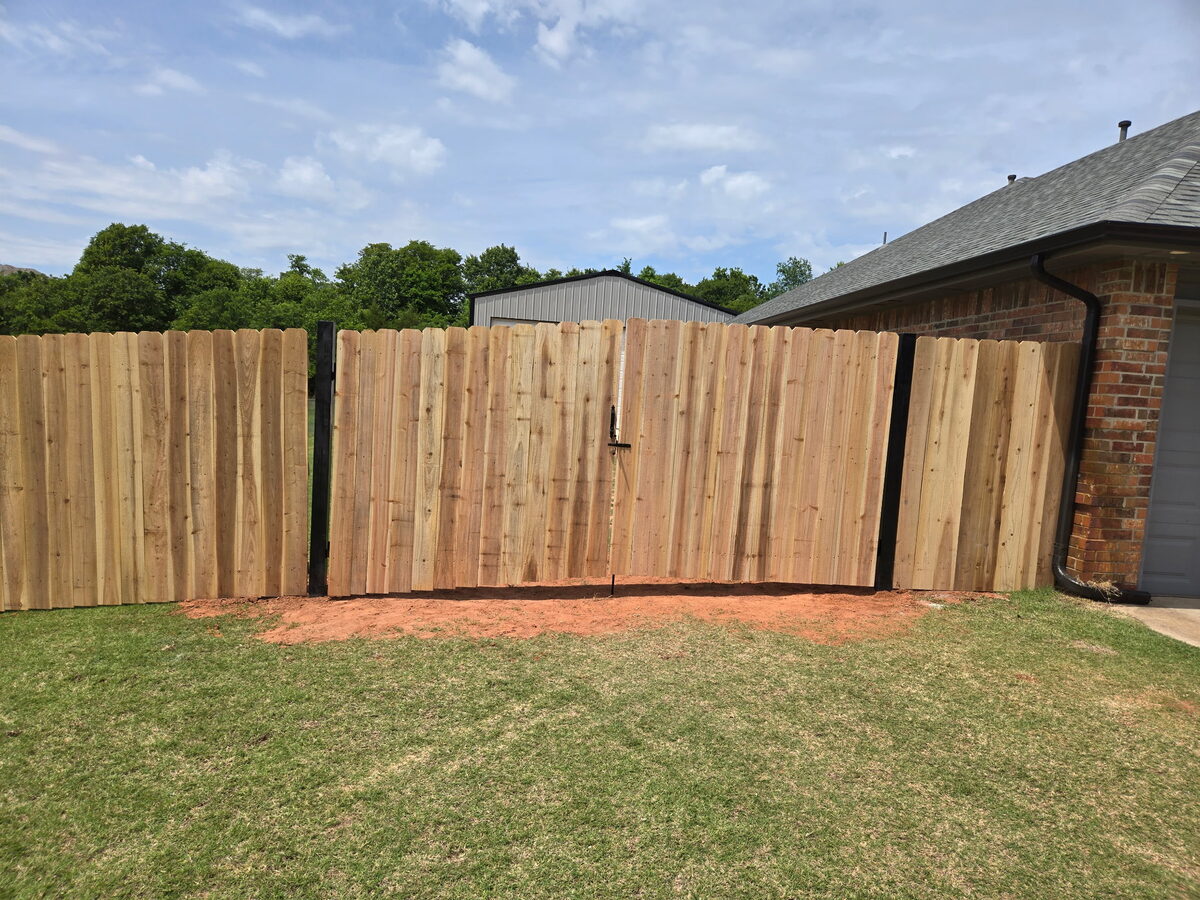 Wood privacy fence with gate built by SWY Fencing