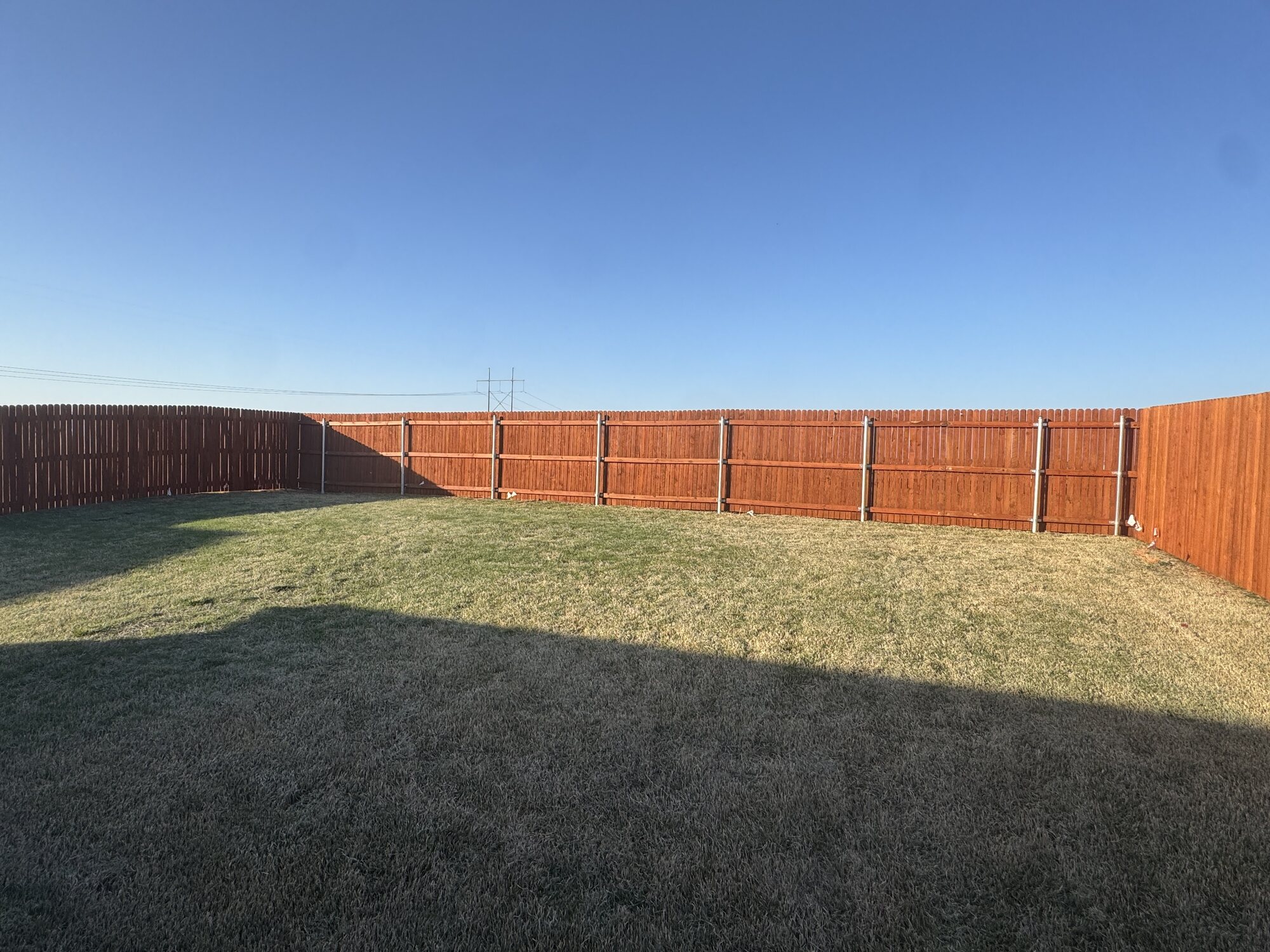 Cedar privacy fence installed by SWY Fencing in an Oklahoma City backyard